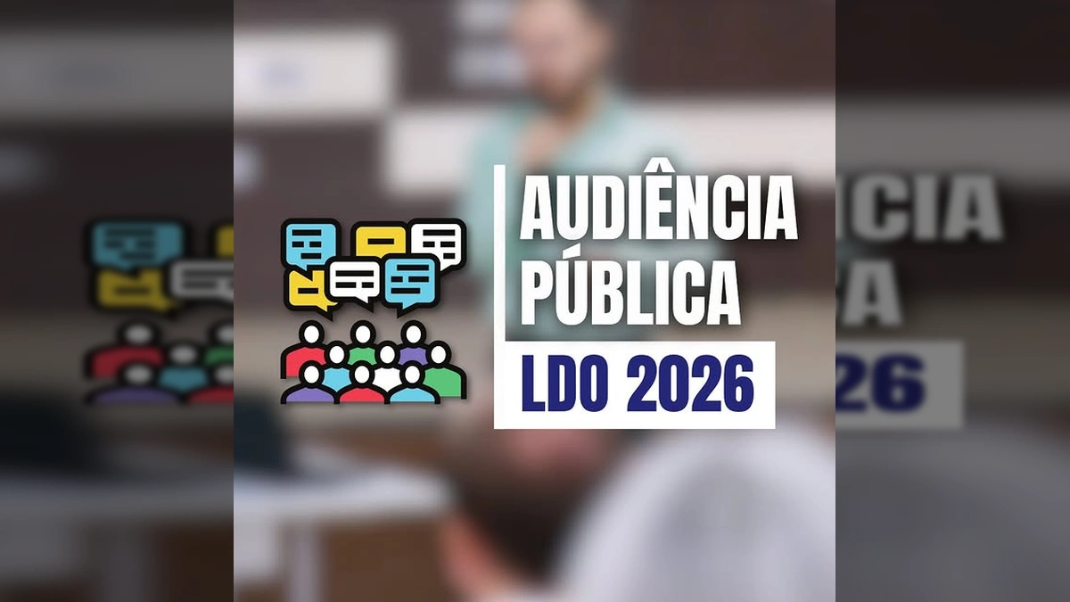 Homem e mulher apresentando sobre o orçamento em audiência pública com público sentado. Créditos: Governo de Vila Rica-MT / Instagram.