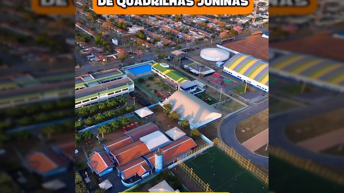 Foto aérea do Festival Gonzagão de Quadrilhas Juninas em Lucas do Rio Verde, com palco e estrutura de evento, créditos a Lucas do Rio Verde Agora.