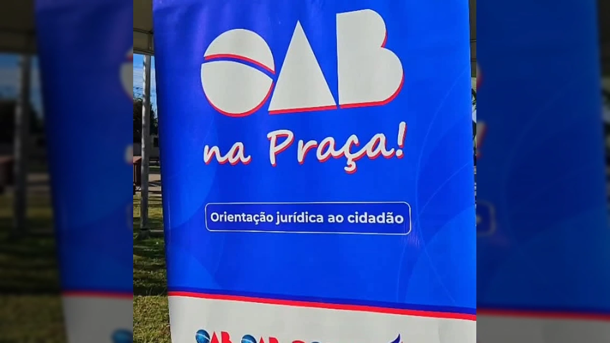 Bandeira da OAB Mato Grosso com o logo do projeto 'OAB na Praça' na cidade de Campos de Júlio. Créditos: Prefeitura Municipal de Campos de Júlio - MT / Instagram.