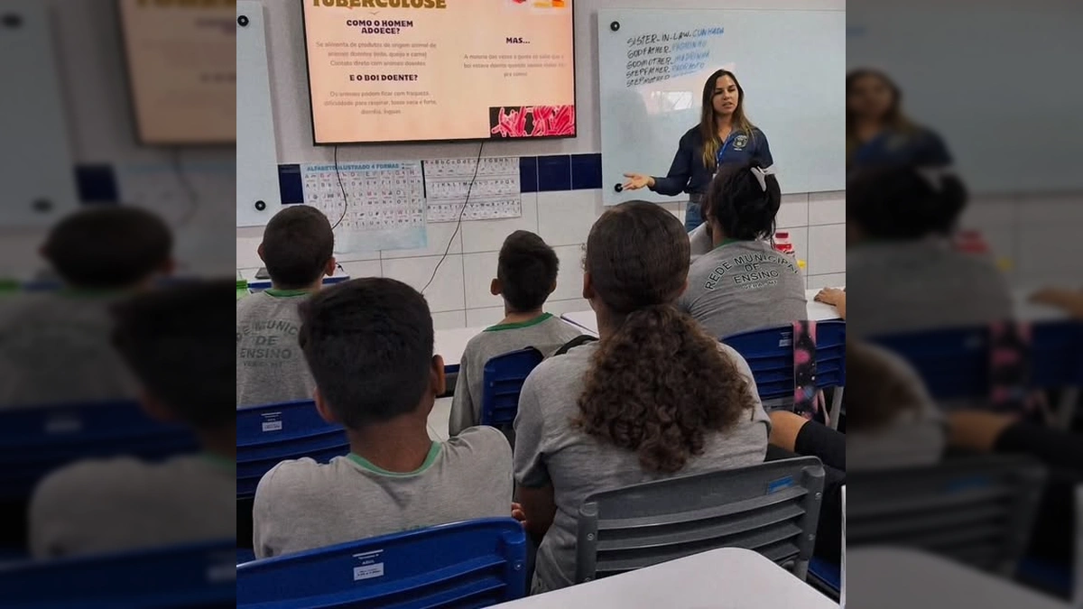 Crianças e veterinárias do INDEA durante o projeto 'Do Campo ao Prato' em Vera, Mato Grosso. Créditos: Prefeitura Municipal de Vera.