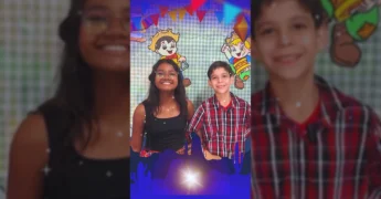 Duas crianças, Yasmim e Gabriel, sorrindo e apresentando o Arraiá das Escolas e Creches de Marcelândia / Instagram: prefeiturademarcelandia
