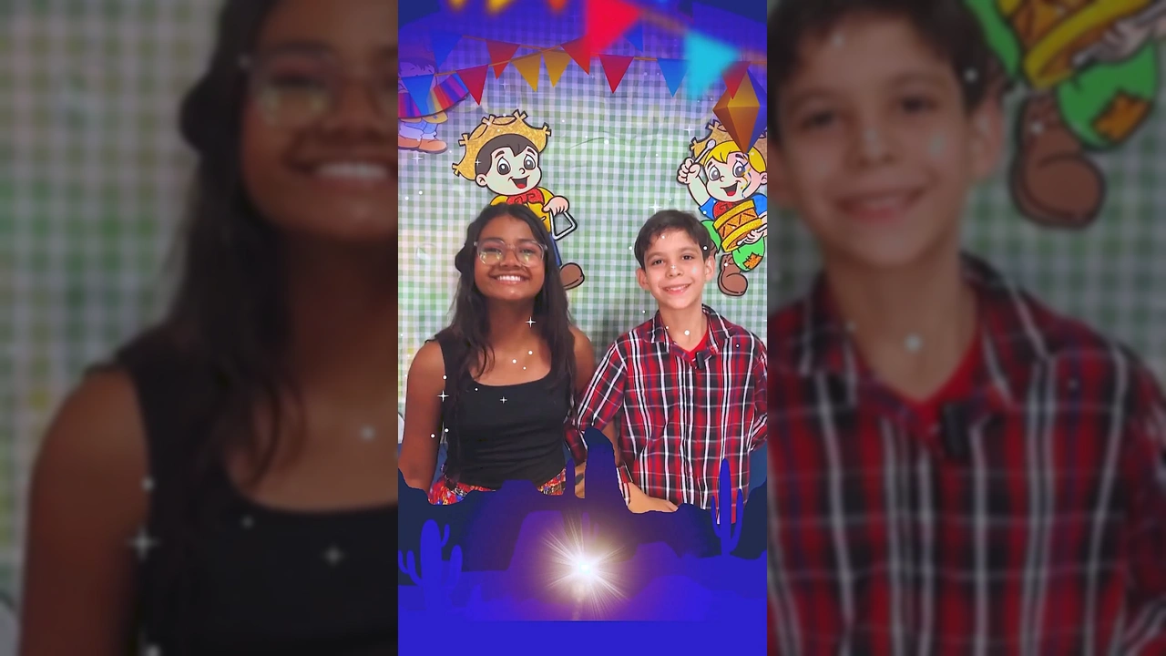 Duas crianças, Yasmim e Gabriel, sorrindo e apresentando o Arraiá das Escolas e Creches de Marcelândia / Instagram: prefeiturademarcelandia