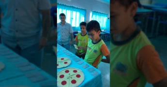 Alunos e professores em aula de frações com pizza. Créditos: equilibrio.psicoterapia no Instagram.