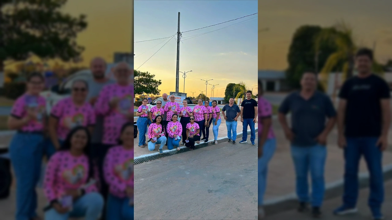 Equipe da Prefeitura de União do Sul divulgando a campanha de vacinação antirrábica, com pessoas vestindo camisetas cor-de-rosa com patinhas. Crédito: @prefeituradeuniaodosul