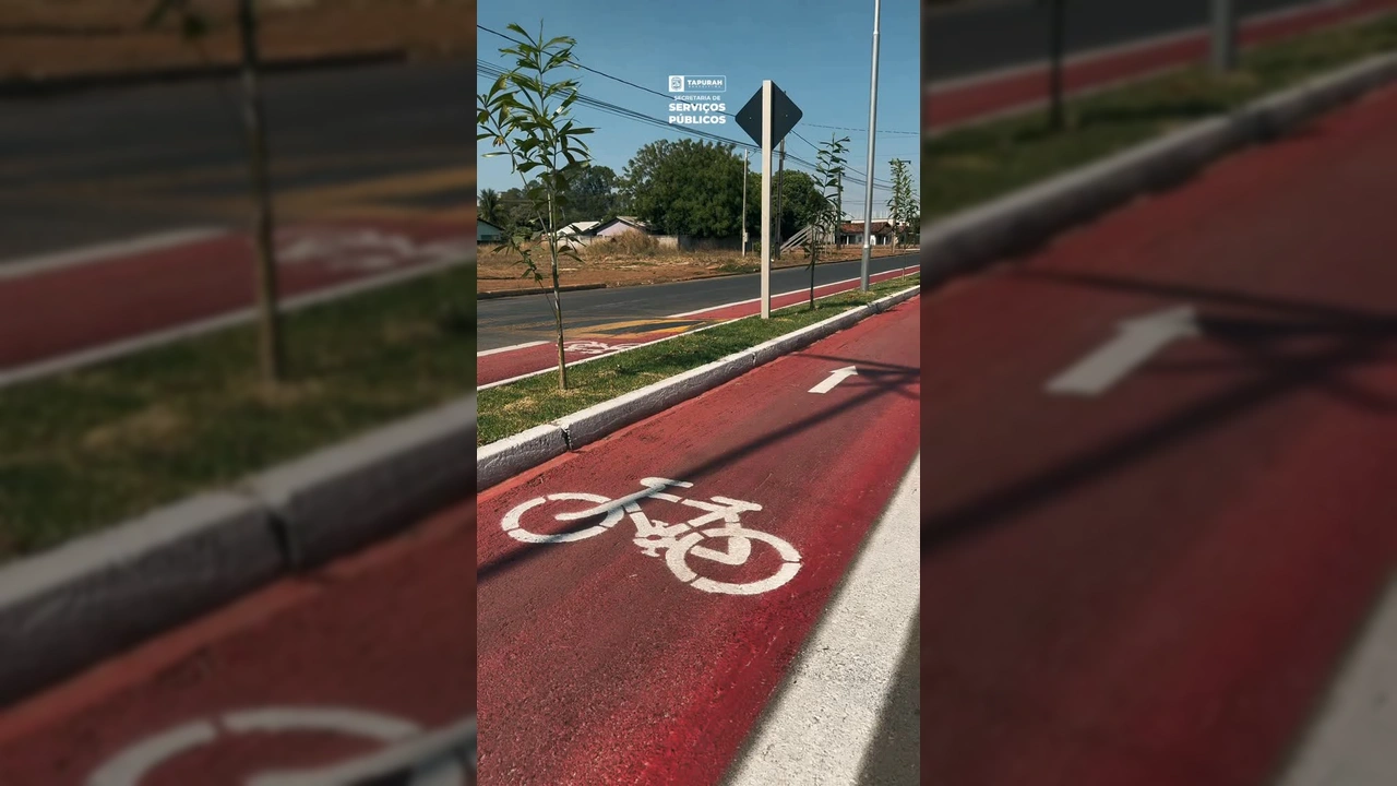 Nova ciclofaixa vermelha na Avenida São Paulo em Tapurah, com ciclista utilizando o espaço exclusivo / Instagram ssp_prefeituradetapurah