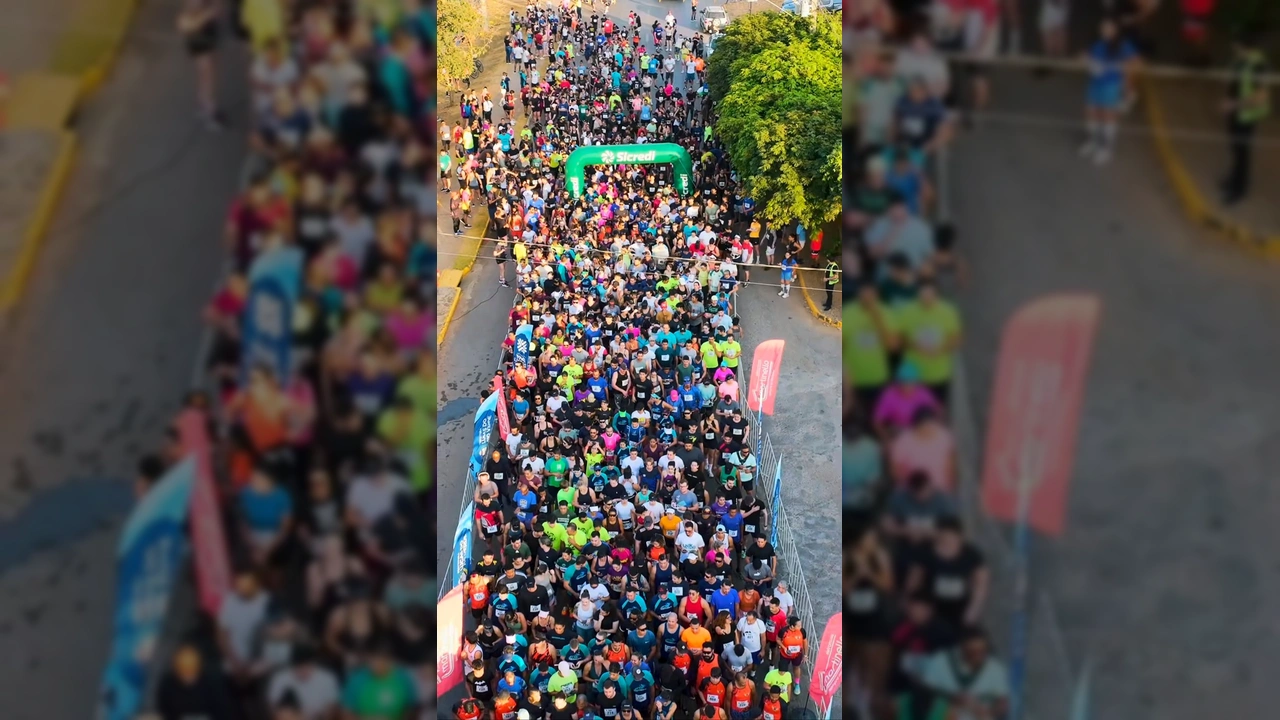 Atletas correndo durante a Corrida de Inverno em Lucas do Rio Verde, com muitos participantes e cenário urbano ao fundo. Crédito: Secretaria de Esporte e Lazer de Lucas do Rio Verde / Instagram @vivalucasesportelazer