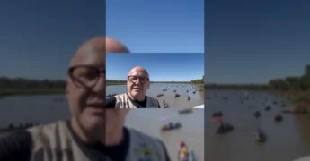 Vista aérea do Rio Paraguai em Cáceres com dezenas de barcos durante o Festival de Pesca Esportiva, com o Vice-Governador Otaviano Pivetta em primeiro plano. Créditos: @otavianopivetta / Instagram.
