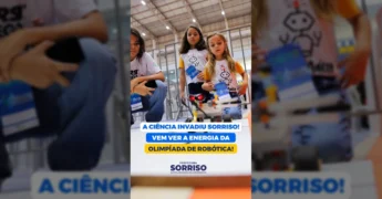 Olimpíada Brasileira de Robótica em Sorriso, com crianças e adolescentes interagindo com robôs em diversas estações. Crédito: Prefeitura de Sorriso.