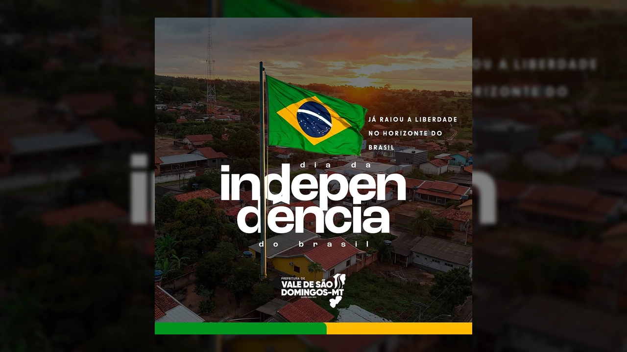 Imagem da bandeira do Brasil tremulando ao pôr do sol em Vale de São Domingos, com casas ao fundo, em homenagem ao Dia da Independência. Créditos: Prefeitura Municipal de Vale de São Domingos / Instagram