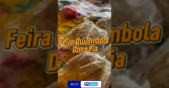 Imagem da Feira Quilombola Dona Fia com produtos artesanais, comidas típicas e dançarinos, creditada à Secretaria De Cultura e Turismo / Instagram.