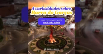 Rotatória principal de Barra do Garças iluminada ao entardecer, com monumentos e carros circulando. Crédito: Prefeitura de Barra do Garças / Instagram.